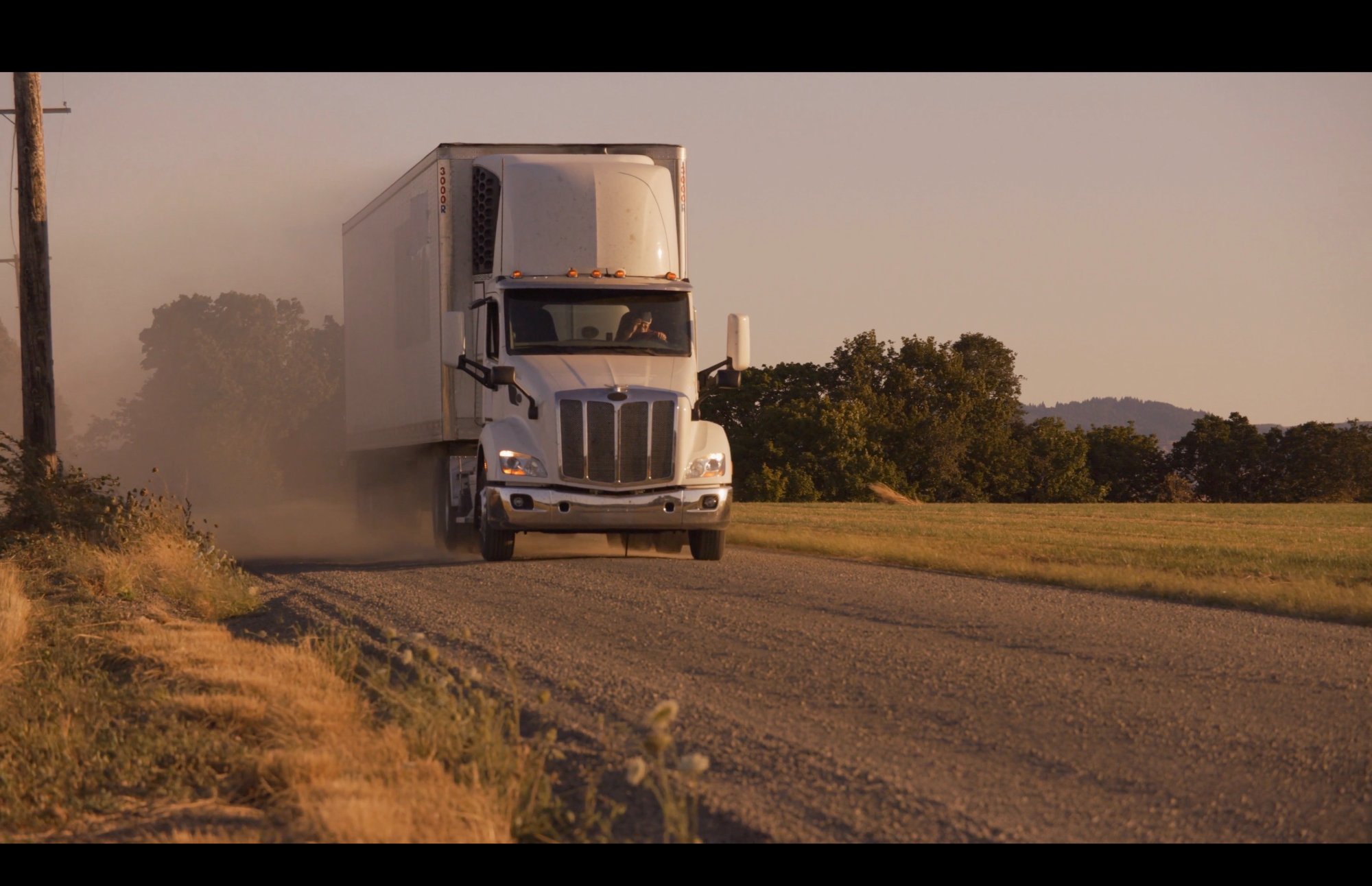 Flatbed carrier on the road